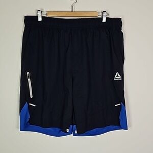 Reebok XL blue slim reflective athletic shirts